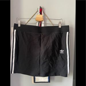Adidas mini skirt, size large, women’s, with tags attached.